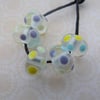 handmade rainbow spot lampwork glass beads