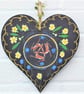 Hares and primroses on a wooden heart - Image 1