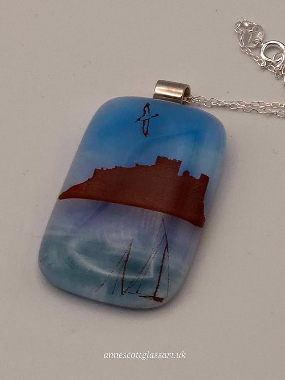Bamburgh Castle on Blue. Fused Glass Pendant with Sterling Silver Findings
