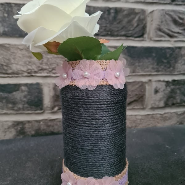 Dark grey yarn wrapped vase with pink flowers