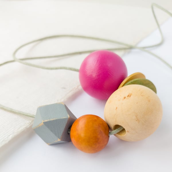 Isla - Hot pink, olive green, burnt orange necklace with grey hexagonal bead