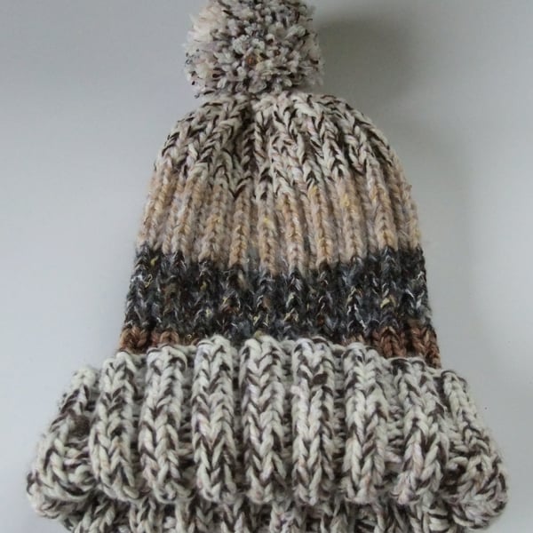 Shades of brown knitted bobble hat hand made from warm soft chunky wool.