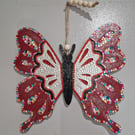Large wooden red and multi coloured butterfly. 