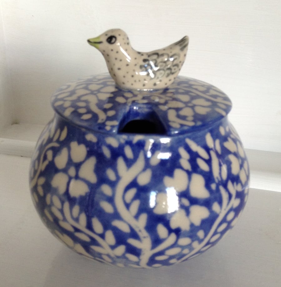 Blue and white lidded stoneware jampot or honey jar with little bird on the lid.