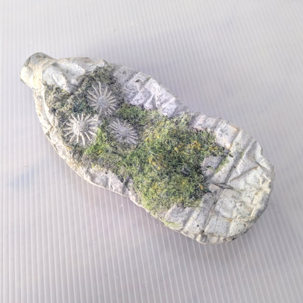 Upstream: Greener Loop Bottle sculpture textiles plus concrete