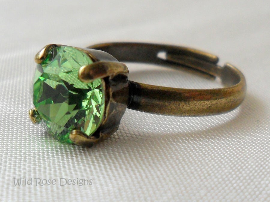 Bronze ring with a Swarovski Peridot crystal