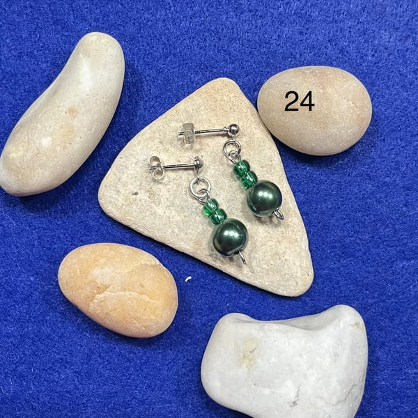 Beautiful green dangling earrings.