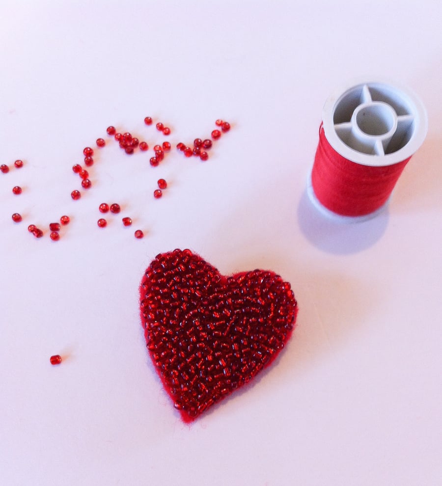 Wear your heart on your sleeve art pin brooch.