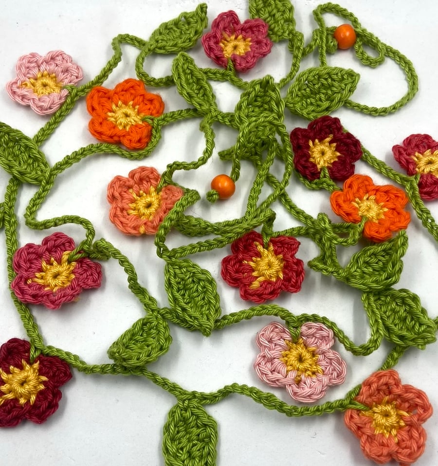 Crochet Flowers Garland in Pinks, Peach and Coral