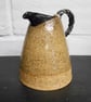 Spotted Clay Stoneware Ceramic Jug, Black clay Spout and Handle white interior.