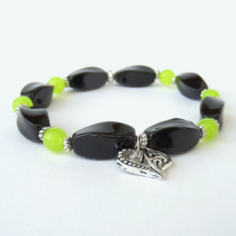 Handmade stretchy bracelet, with black onyx, green peridot & heart charm 