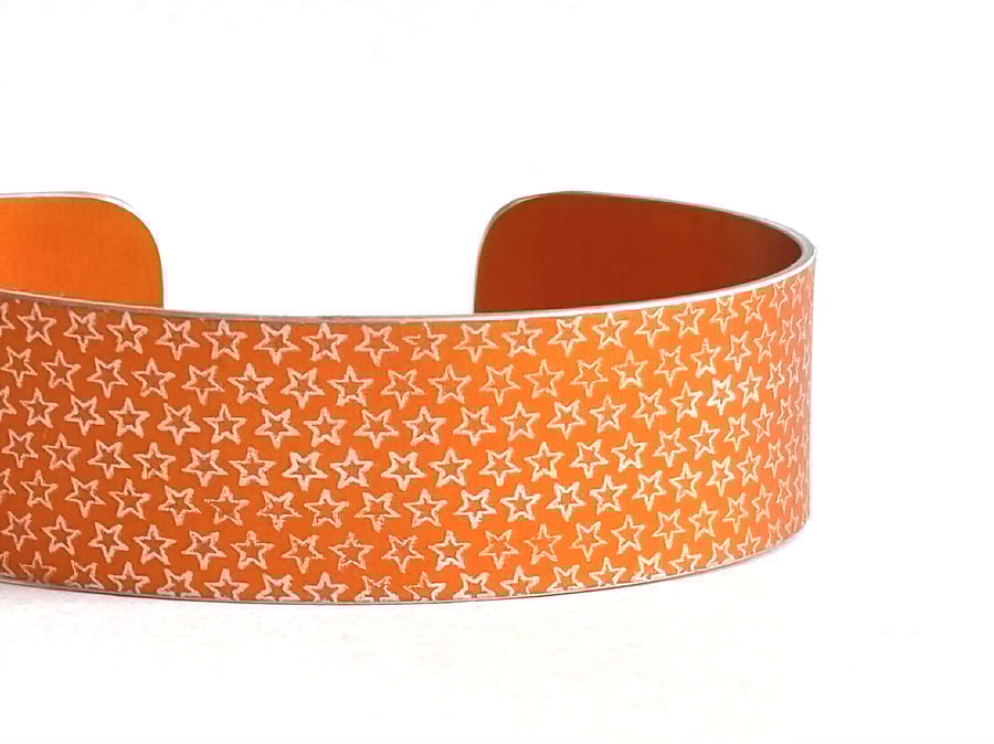Star pattern aluminium cuff orange - second