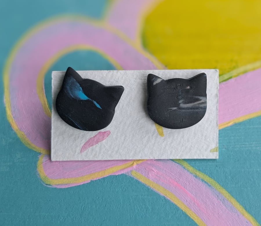 Cat earrings - large navy blue marbled stud earrings in the shape of a cats head