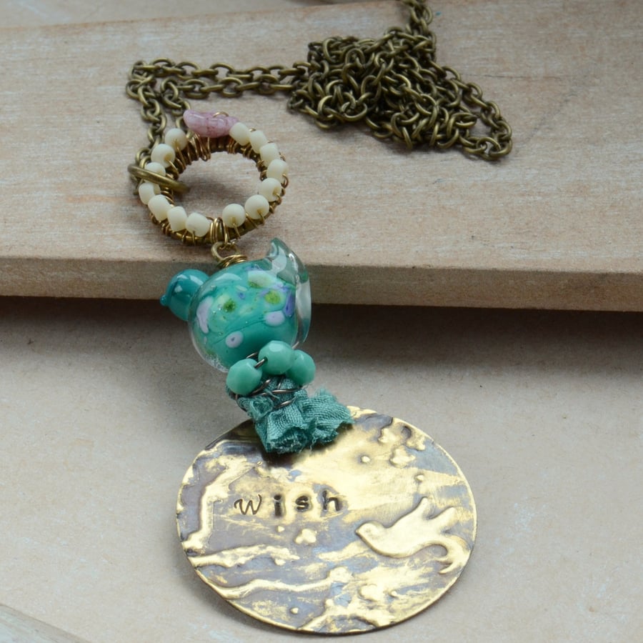 Handstamped Wish Embossed Brass Pendant with Turquoise Lampwork Bird