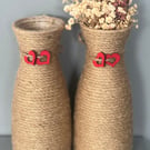 Twine hand wrapped plastic vase with a cute heart detail 