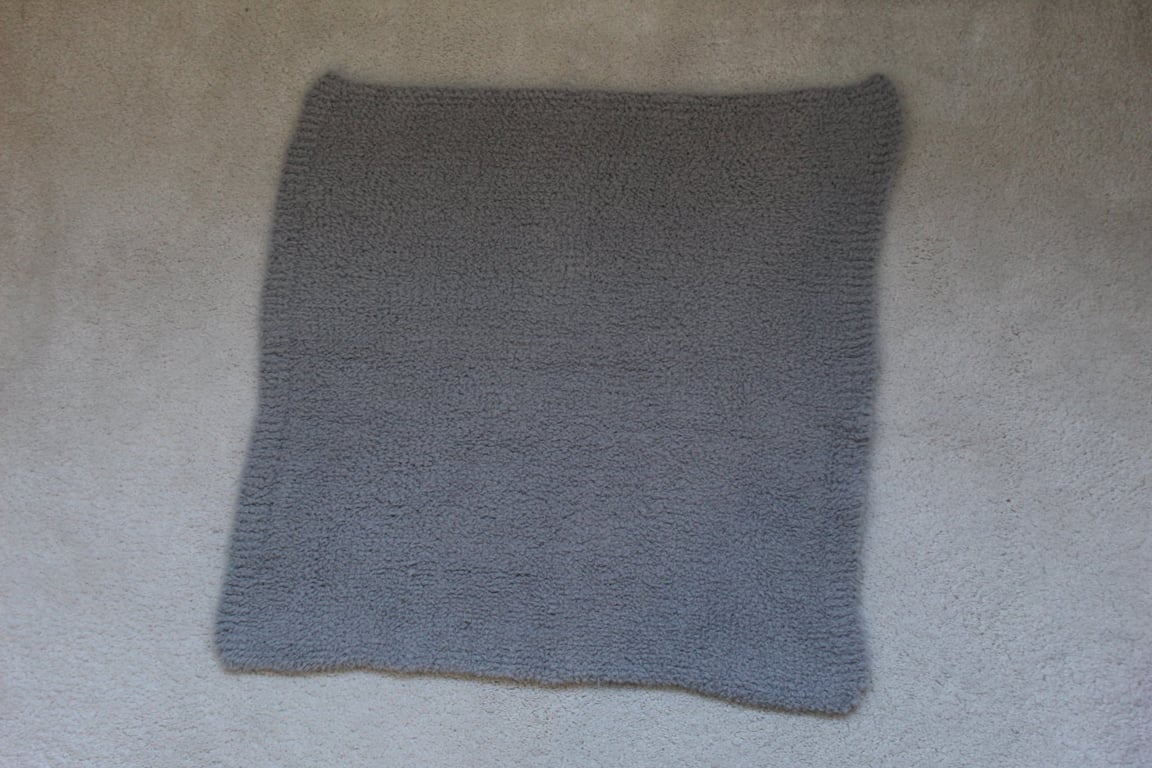 Handknitted Grey Baby Blanket or Comforter. Very soft.