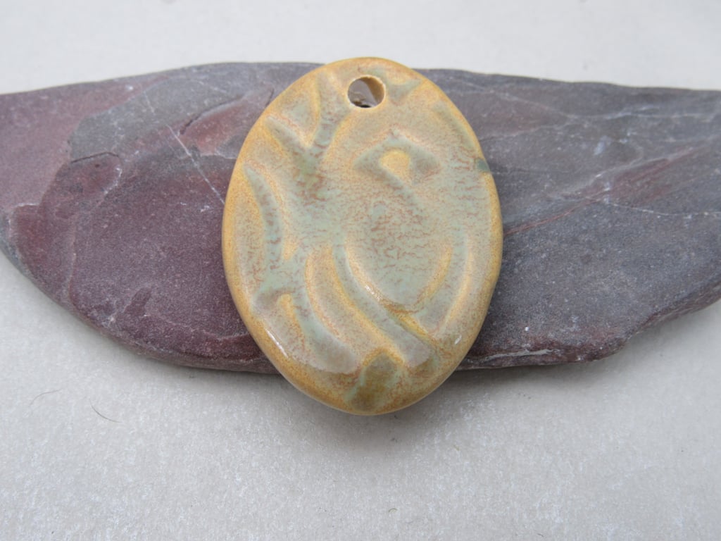 Large Old Gold Knotwork Ceramic Pendant