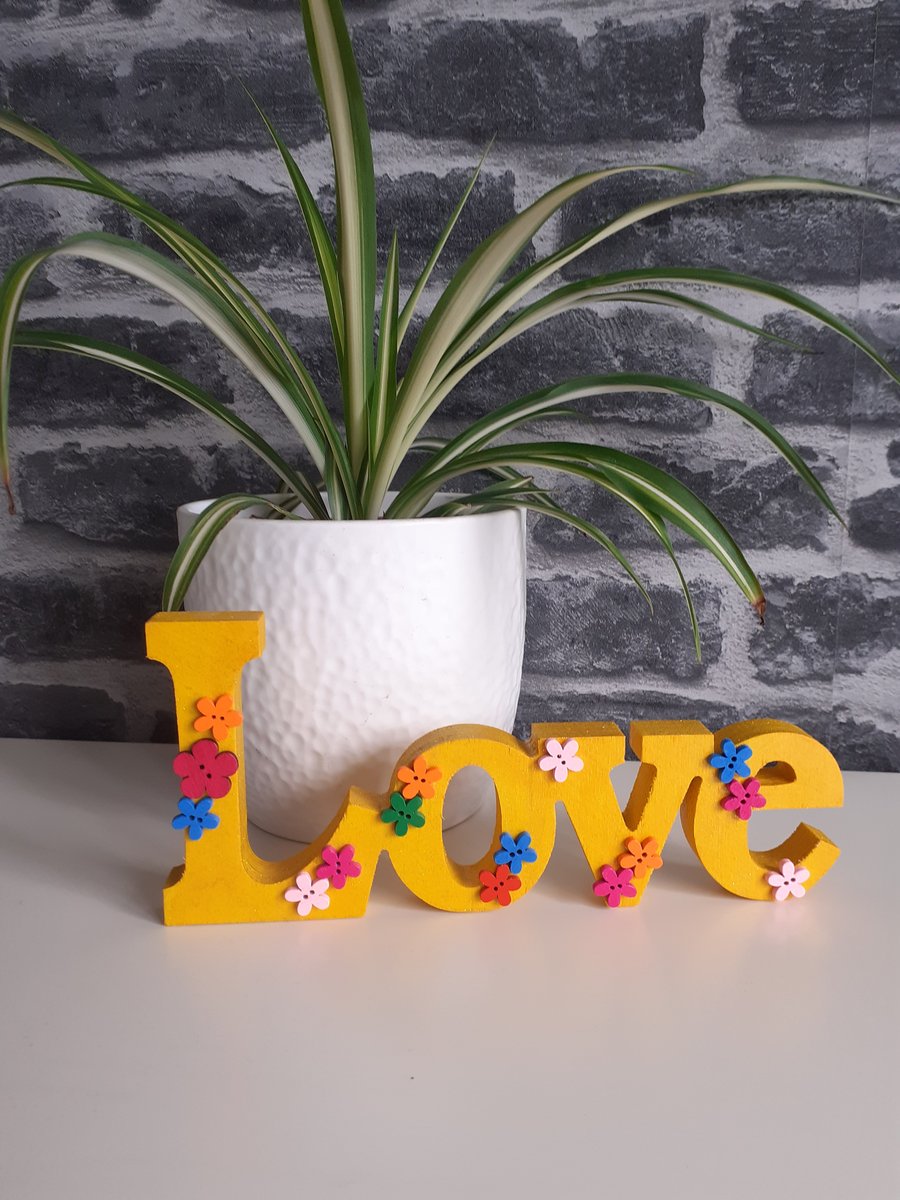Wooden love word decoration yellow and sparkly with flowers