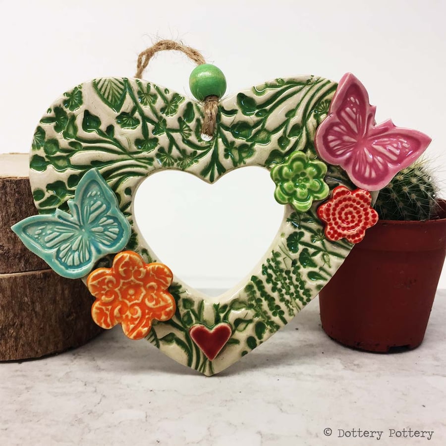 Heart shaped Ceramic floral wreath decoration with butterflies and flowers 