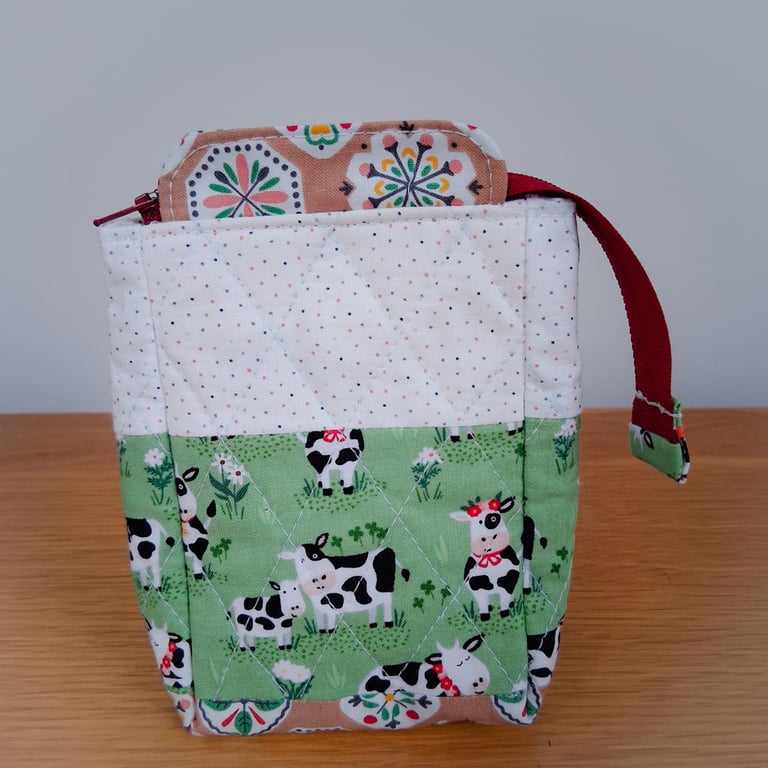 Quilted handmade cotton zipped carton pouch: cows print