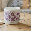 Lilac flowers hand knit mug hug
