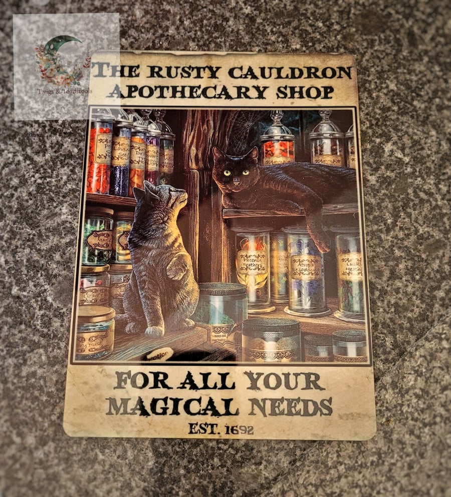 The rusty cauldron Black cat apothecary shop metal sign 