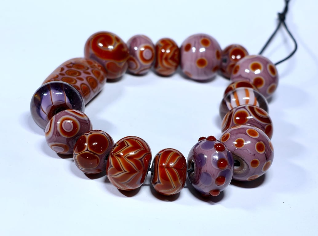 Handmade brown and purple lamp work glass beads