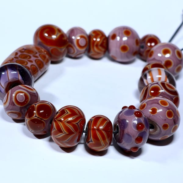 Handmade brown and purple lamp work glass beads