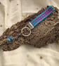 Hand woven key fob with attached Earth planet embellishment orb