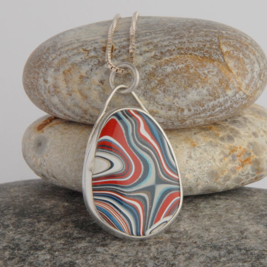 Swirly Dagenham fordite reversible pendant