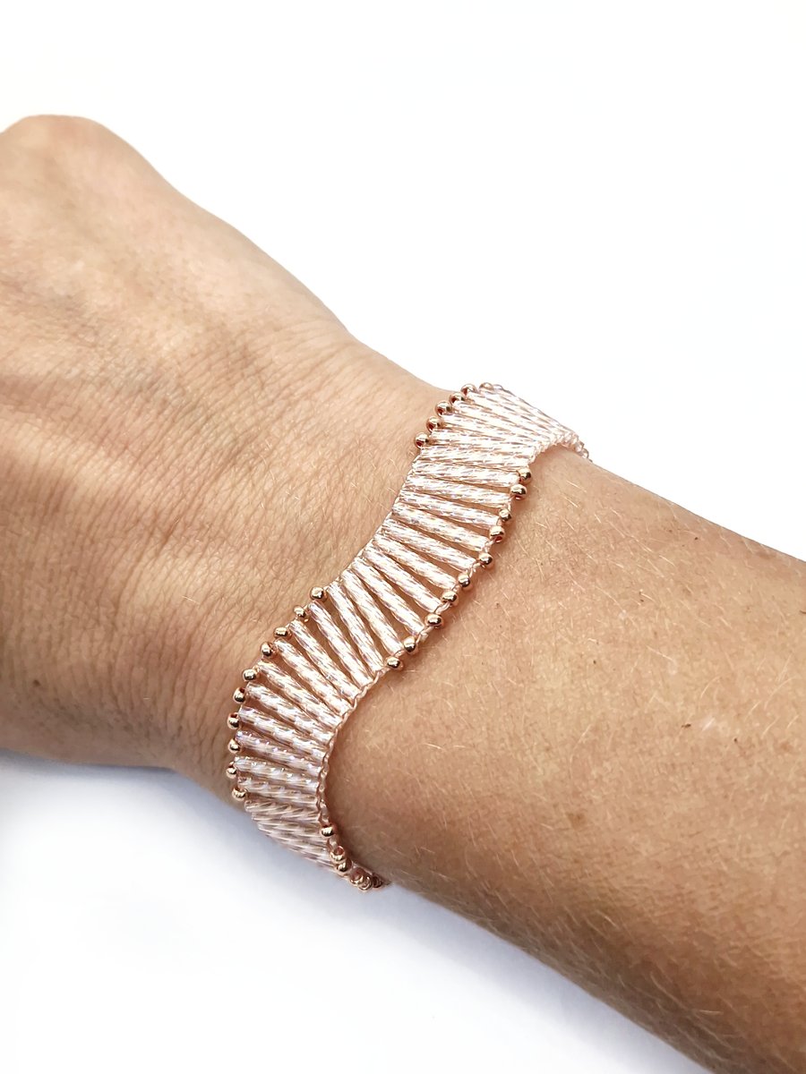Peach and rose gold twisted bugle bead wavy bracelet