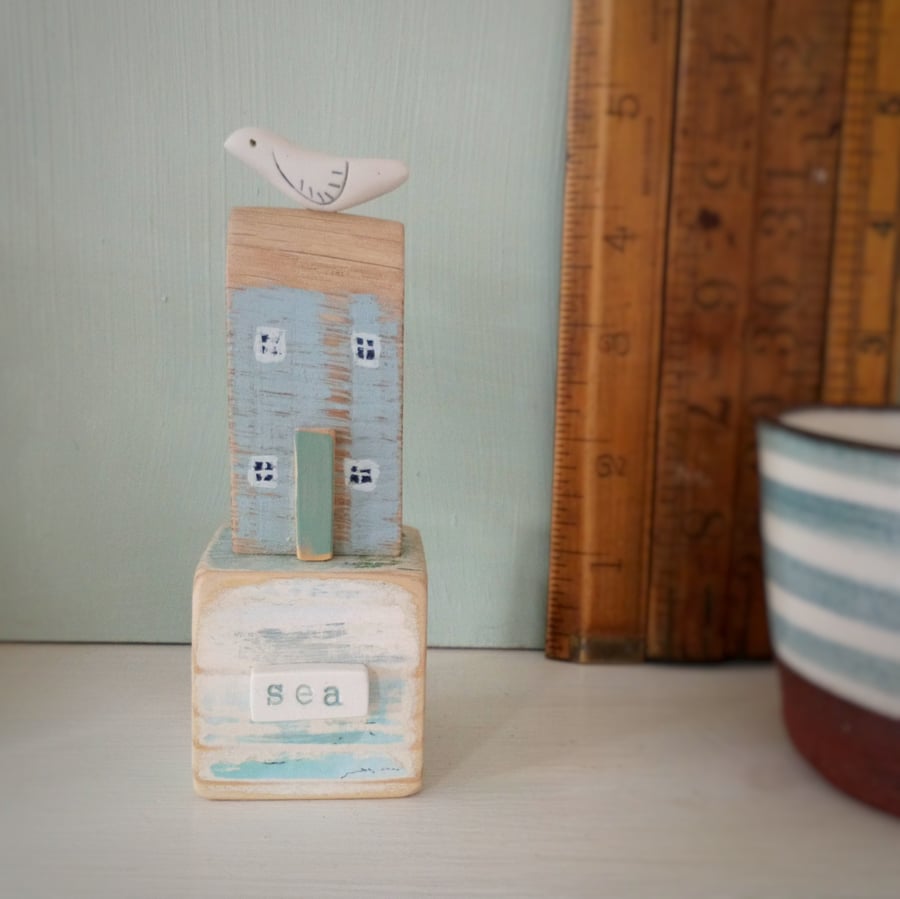 SALE - Little wooden house with clay bird on a vintage toy block