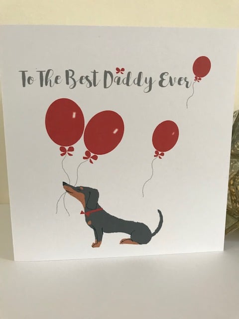 Best Daddy Ever Greeting Card featuring a Dachshund with red balloons