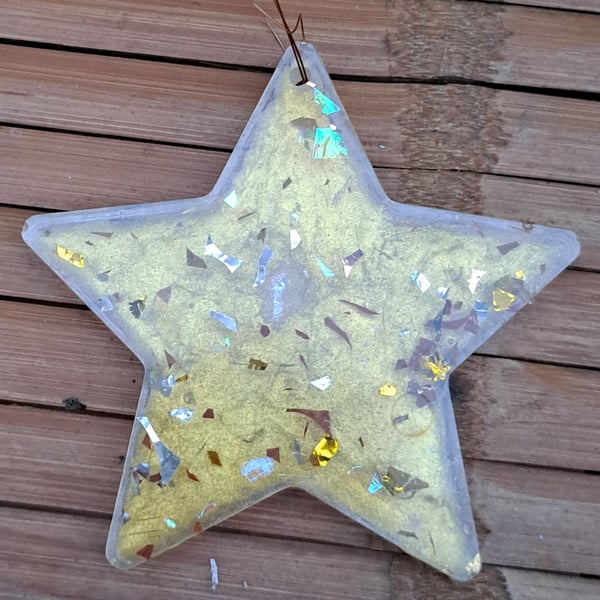 Hanging resin gold and sparkly star