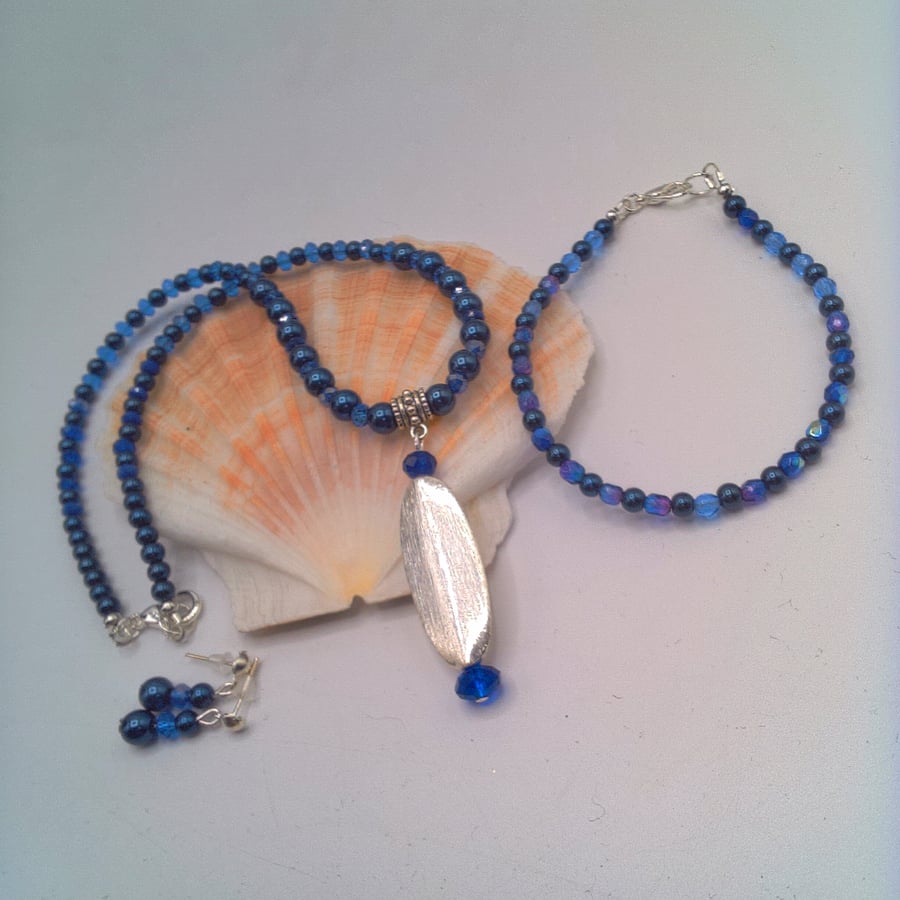 Blue Pearl and Crystal Necklace with a Silver Pendant Bracelet and Earrings