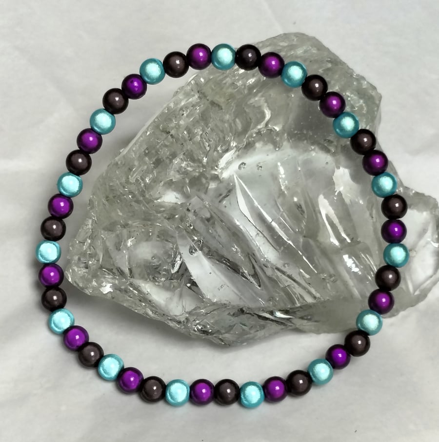 AL130b Purple, turquoise and black miracle bead anklet, 10.5"