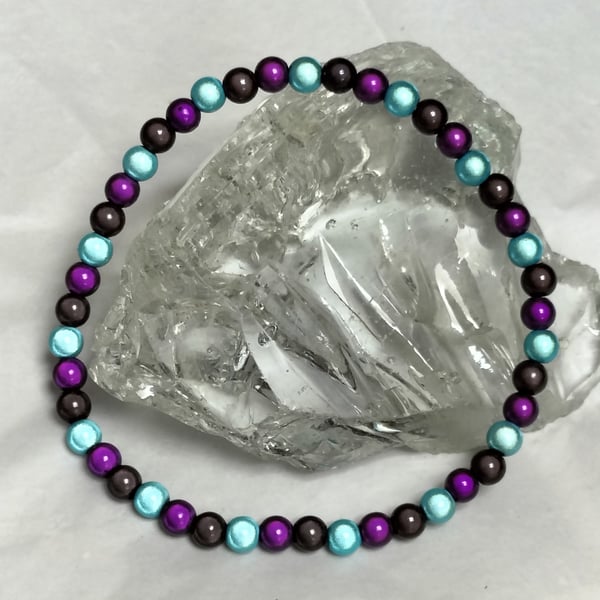 AL130b Purple, turquoise and black miracle bead anklet, 10.5"