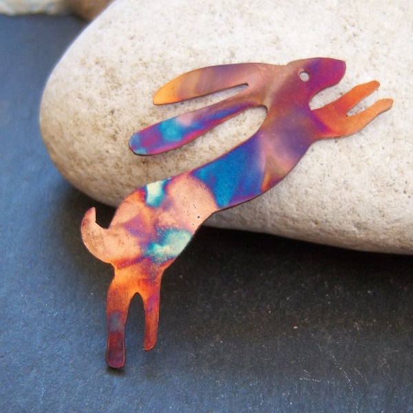 Flame painted copper hare brooch