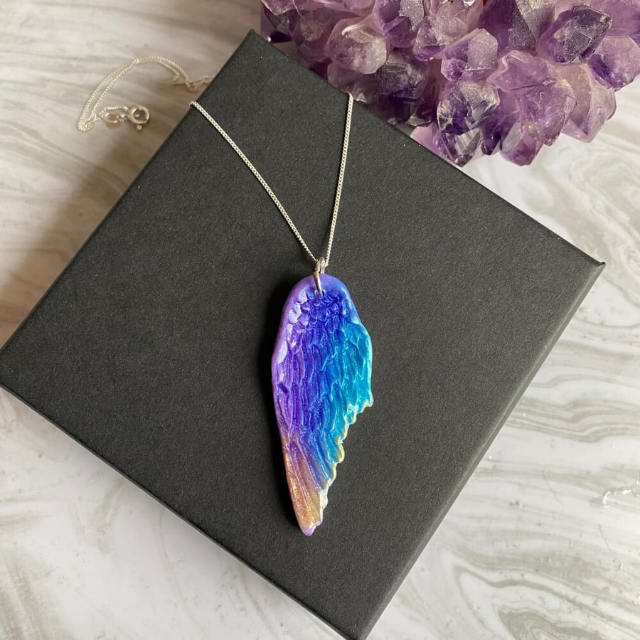 Angel wing feather statement polymer clay and resin pendant on sterling silver