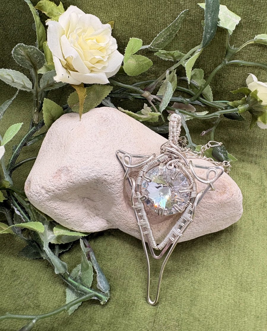Elven inspired silver plated wire wrapped pendant
