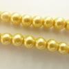 100 gold glass pearls