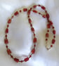 Sunstone Necklace accented with Spessartine Garnet and Sterling Silver