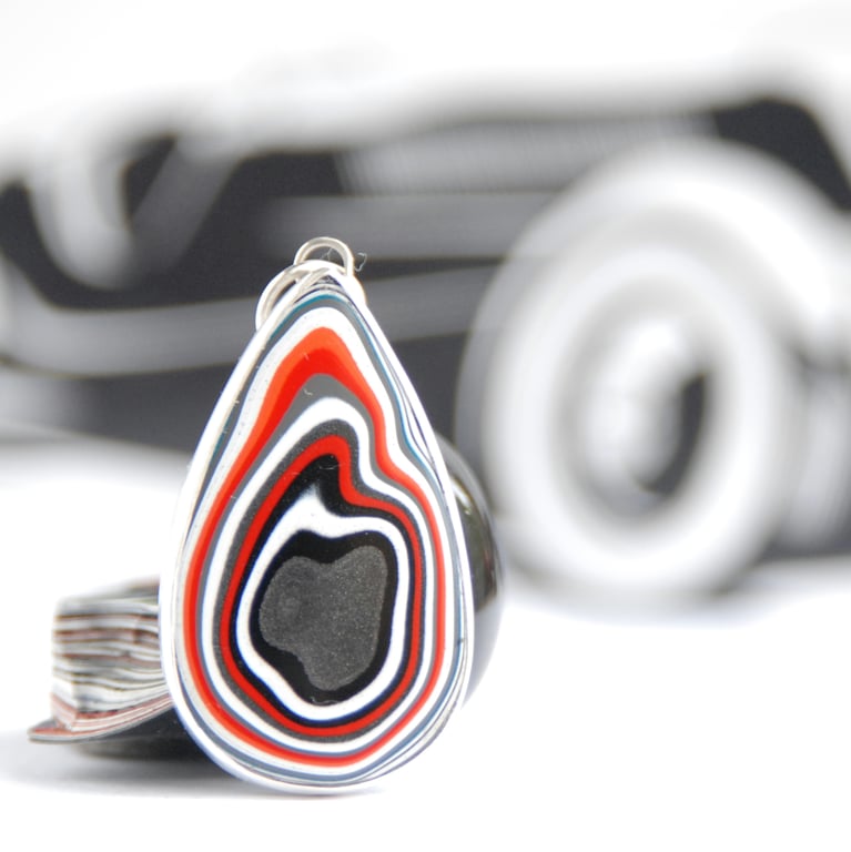 Jeep fordite pendant (red and orange)
