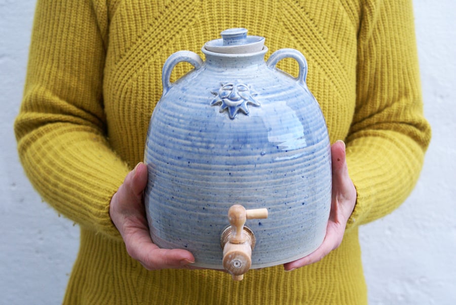 Ceramic water cooler with sun and moon design - glazed in speckled blue