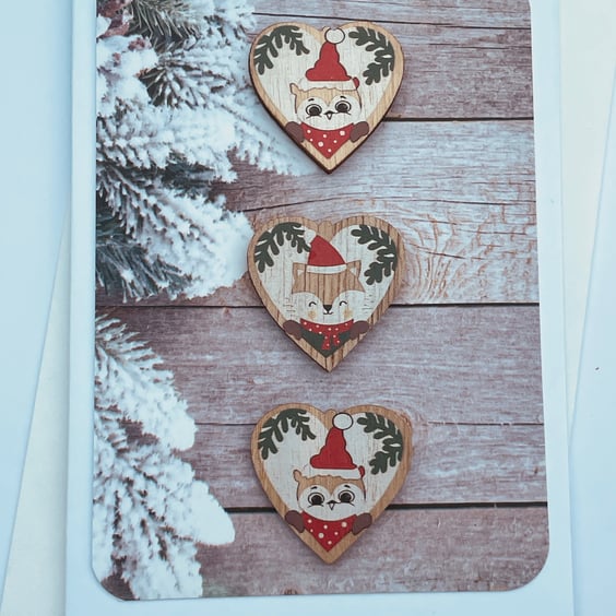 Cute Christmas characters on wooden hearts Christmas card