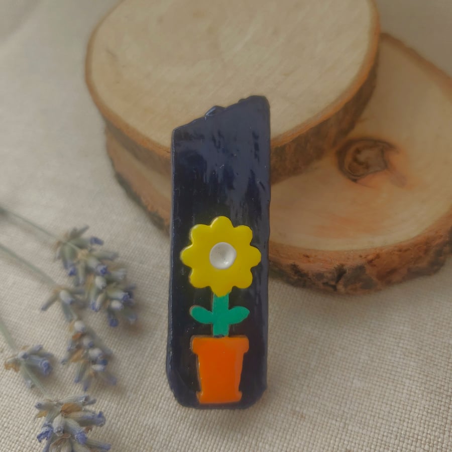 Bright wooden flower brooch