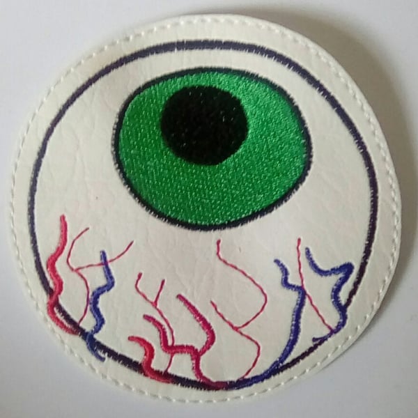 670. Creepy eyeball coaster.