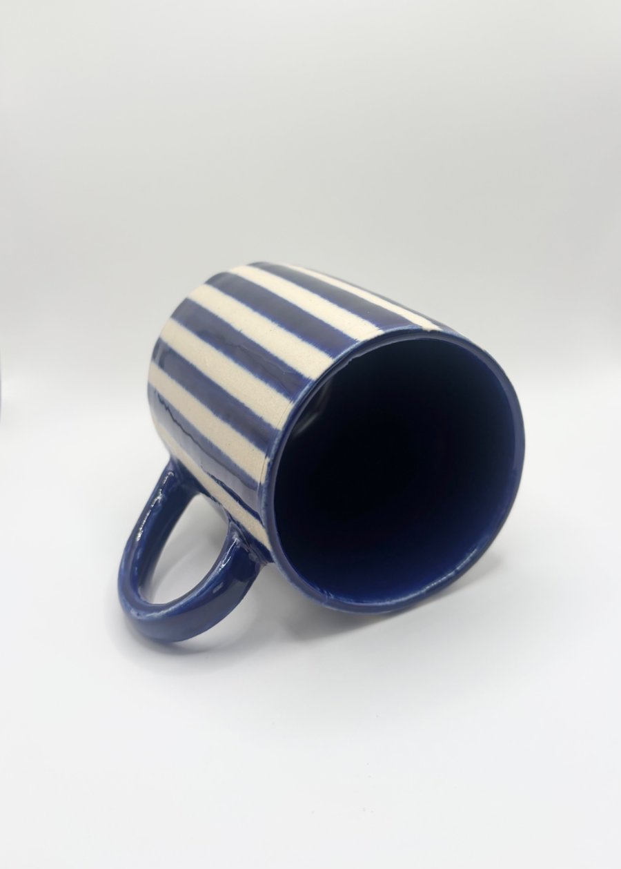 Navy blue mug with stripes 