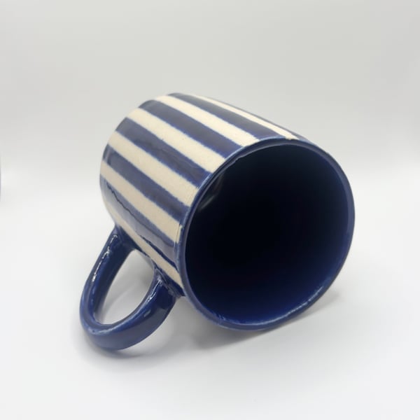 Navy blue mug with stripes 