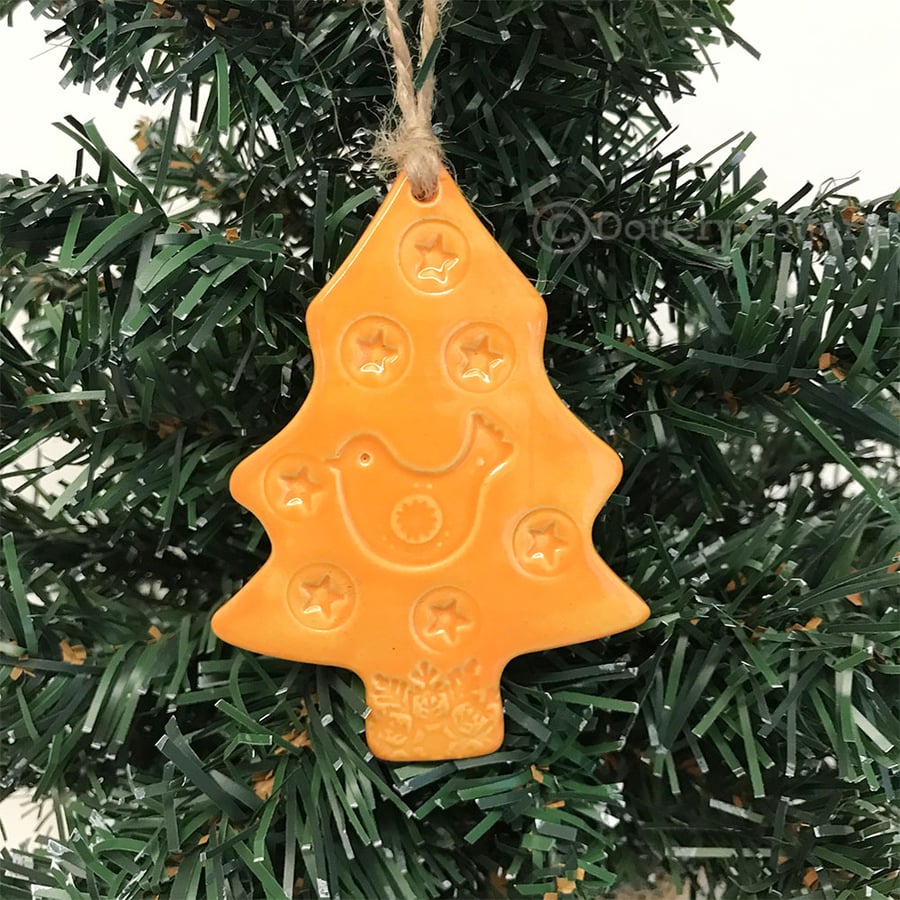 Orange Ceramic Christmas tree decoration with bird and star Pottery decoration
